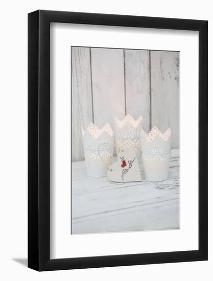 Candles in pots and heart pendant as a decoration, still life-Andrea Haase-Framed Photographic Print