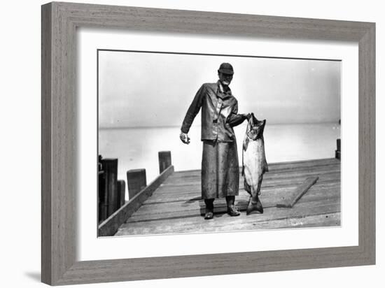 Cannery Worker with Salmon, Circa 1909-Asahel Curtis-Framed Giclee Print