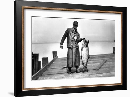 Cannery Worker with Salmon, Circa 1909-Asahel Curtis-Framed Giclee Print