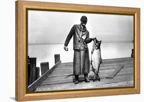 Cannery Worker with Salmon, Circa 1909-Asahel Curtis-Framed Premier Image Canvas