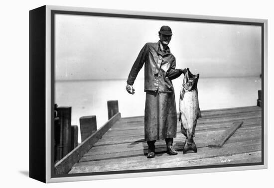 Cannery Worker with Salmon, Circa 1909-Asahel Curtis-Framed Premier Image Canvas