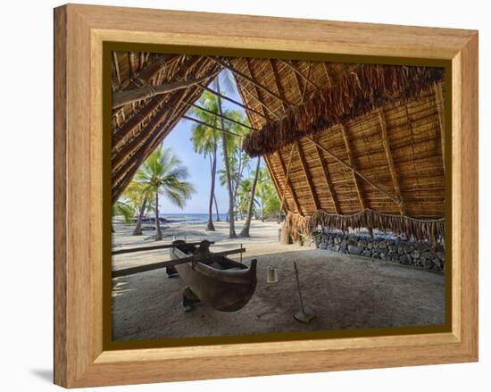 Canoe inside the Halau structure at the National Historic Park Pu'uhonua o Honaunau, Hawaii-Julie Eggers-Framed Premier Image Canvas