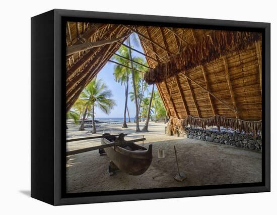 Canoe inside the Halau structure at the National Historic Park Pu'uhonua o Honaunau, Hawaii-Julie Eggers-Framed Premier Image Canvas