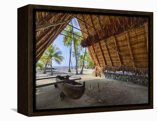 Canoe inside the Halau structure at the National Historic Park Pu'uhonua o Honaunau, Hawaii-Julie Eggers-Framed Premier Image Canvas