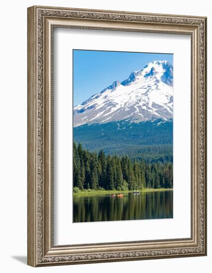 Canoes and rowboat on the still waters of Trillium Lake with Mount Hood, part of the Cascade Range,-Martin Child-Framed Photographic Print