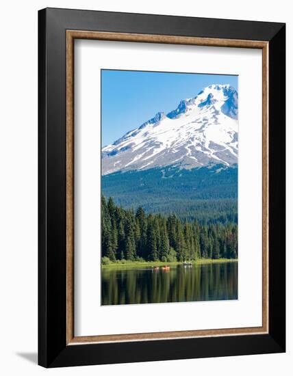 Canoes and rowboat on the still waters of Trillium Lake with Mount Hood, part of the Cascade Range,-Martin Child-Framed Photographic Print