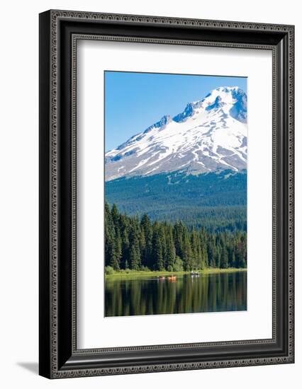 Canoes and rowboat on the still waters of Trillium Lake with Mount Hood, part of the Cascade Range,-Martin Child-Framed Photographic Print