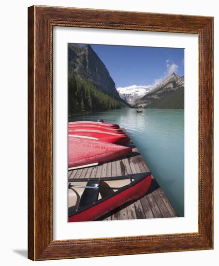 Canoes for Hire on Lake Louise, Banff National Park, UNESCO World Heritage Site, Alberta, Rocky Mou-Martin Child-Framed Photographic Print