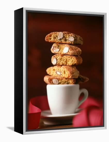 Cantucci Biscuits Piled on a Coffee Cup-Luzia Ellert-Framed Premier Image Canvas