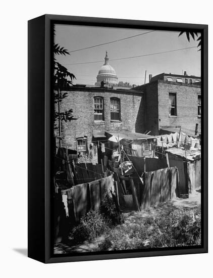 Capital Building Sitting Behind Slum Dwellings in the City-Dmitri Kessel-Framed Premier Image Canvas