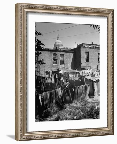 Capital Building Sitting Behind Slum Dwellings in the City-Dmitri Kessel-Framed Photographic Print
