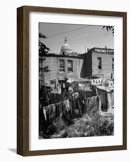 Capital Building Sitting Behind Slum Dwellings in the City-Dmitri Kessel-Framed Photographic Print