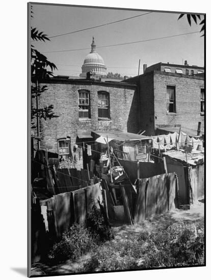 Capital Building Sitting Behind Slum Dwellings in the City-Dmitri Kessel-Mounted Photographic Print