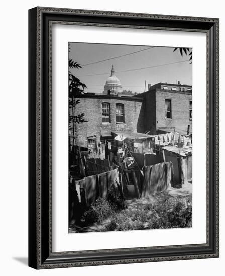 Capital Building Sitting Behind Slum Dwellings in the City-Dmitri Kessel-Framed Photographic Print