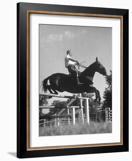 Capt. Theodore Galiza, Russian Riding Master, Taking Triple Bars, Horse Show Organized-Alfred Eisenstaedt-Framed Photographic Print