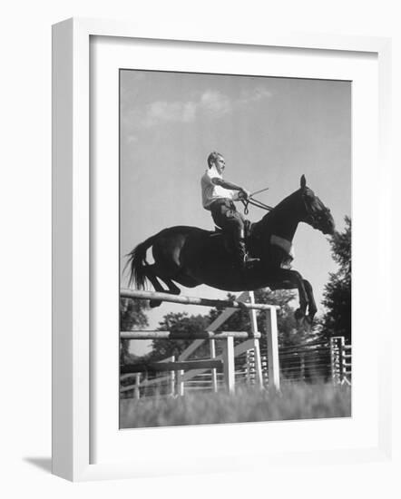 Capt. Theodore Galiza, Russian Riding Master, Taking Triple Bars, Horse Show Organized-Alfred Eisenstaedt-Framed Photographic Print