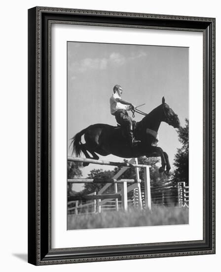 Capt. Theodore Galiza, Russian Riding Master, Taking Triple Bars, Horse Show Organized-Alfred Eisenstaedt-Framed Photographic Print