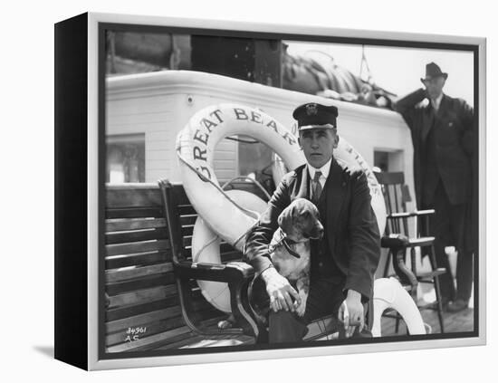 Captain Lane Erickson of the Great Bear with Dog, 1916-Asahel Curtis-Framed Premier Image Canvas