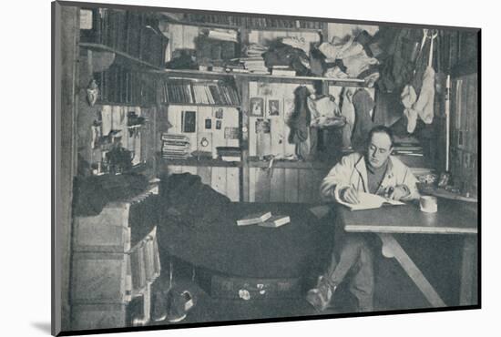 'Captain R. F. Scott, R.N., writing in his diary', c1900-1912, (1936)-Unknown-Mounted Photographic Print