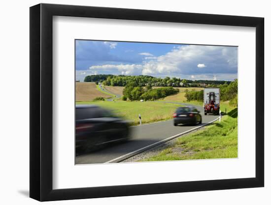 Car and Truck Driving on Winding Country Road, Storm Clouds, Motion Blur, Thuringia, Germany-Andreas Vitting-Framed Photographic Print