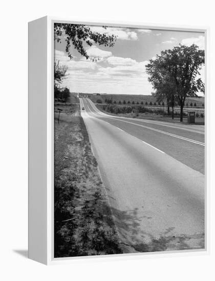 Car Driving West of Omaha on Highway 30-Allan Grant-Framed Premier Image Canvas