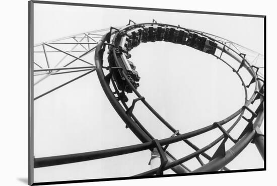 Car Going Through Roller Coaster Loop-null-Mounted Photographic Print