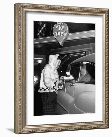 Car Hop "Bunny" Wearing $128 Parka Uniform Serves a 75 Cent Hamburger-George Silk-Framed Photographic Print