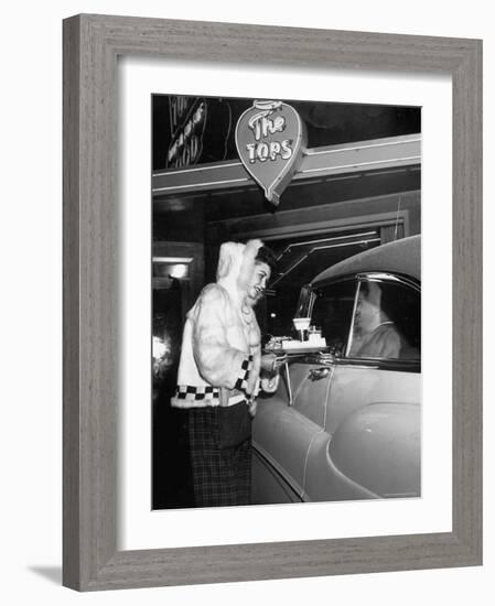 Car Hop "Bunny" Wearing $128 Parka Uniform Serves a 75 Cent Hamburger-George Silk-Framed Photographic Print