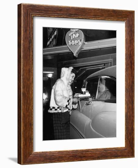 Car Hop "Bunny" Wearing $128 Parka Uniform Serves a 75 Cent Hamburger-George Silk-Framed Photographic Print