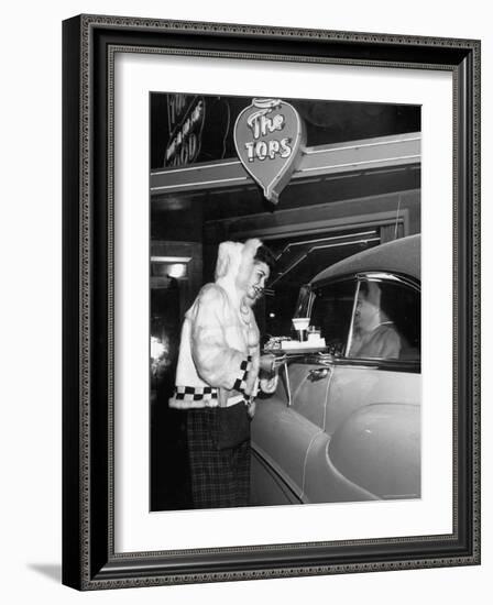 Car Hop "Bunny" Wearing $128 Parka Uniform Serves a 75 Cent Hamburger-George Silk-Framed Photographic Print