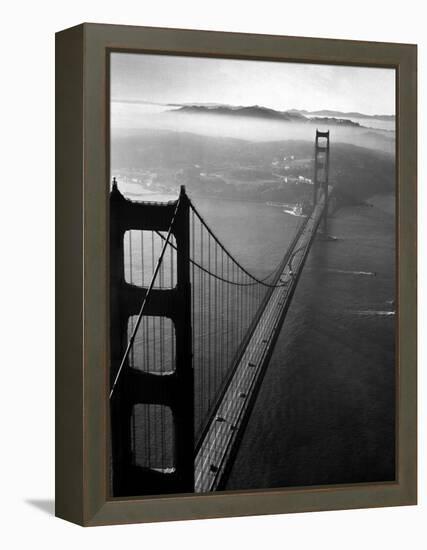 Car Lanes across the Golden Gate Bridge with Fog-Covered City of San Francisco in Background-Margaret Bourke-White-Framed Premier Image Canvas