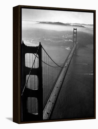 Car Lanes across the Golden Gate Bridge with Fog-Covered City of San Francisco in Background-Margaret Bourke-White-Framed Premier Image Canvas