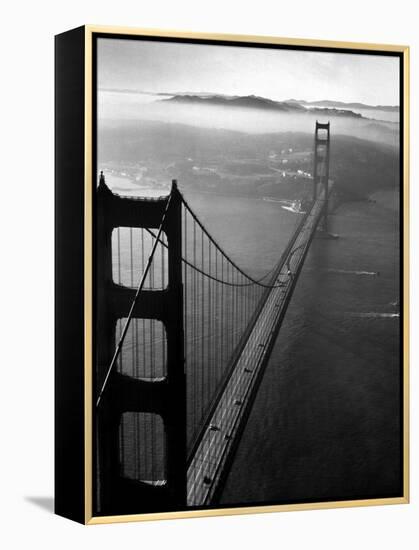 Car Lanes across the Golden Gate Bridge with Fog-Covered City of San Francisco in Background-Margaret Bourke-White-Framed Premier Image Canvas