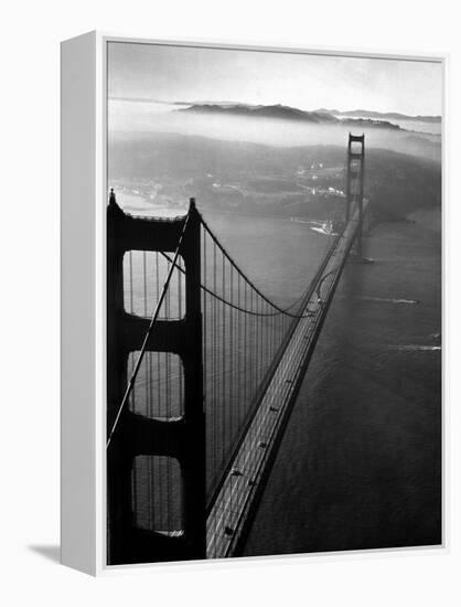 Car Lanes across the Golden Gate Bridge with Fog-Covered City of San Francisco in Background-Margaret Bourke-White-Framed Premier Image Canvas