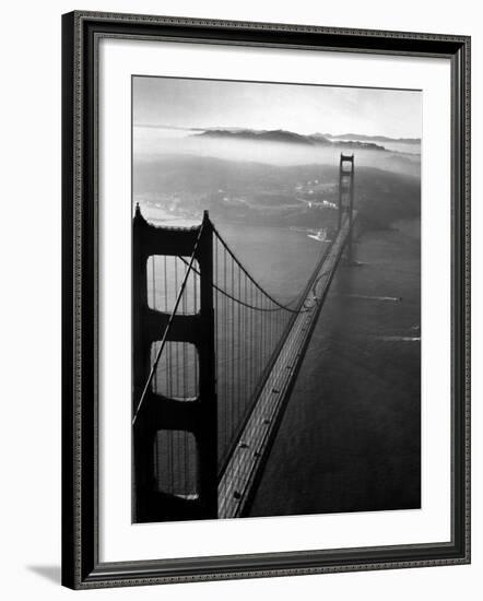 Car Lanes across the Golden Gate Bridge with Fog-Covered City of San Francisco in Background-Margaret Bourke-White-Framed Premium Photographic Print