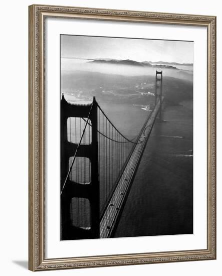 Car Lanes across the Golden Gate Bridge with Fog-Covered City of San Francisco in Background-Margaret Bourke-White-Framed Premium Photographic Print