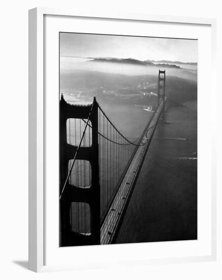 Car Lanes across the Golden Gate Bridge with Fog-Covered City of San Francisco in Background-Margaret Bourke-White-Framed Premium Photographic Print