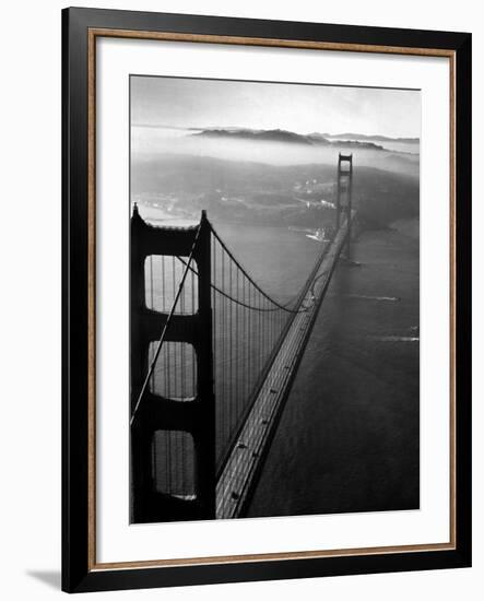 Car Lanes across the Golden Gate Bridge with Fog-Covered City of San Francisco in Background-Margaret Bourke-White-Framed Premium Photographic Print