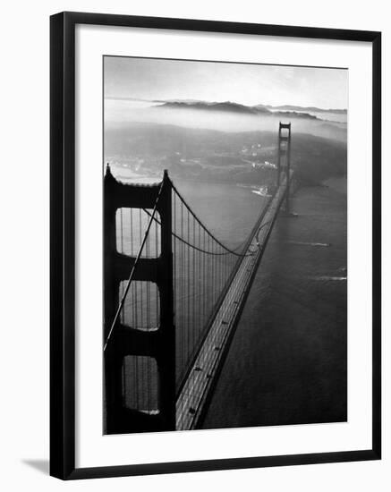 Car Lanes across the Golden Gate Bridge with Fog-Covered City of San Francisco in Background-Margaret Bourke-White-Framed Premium Photographic Print