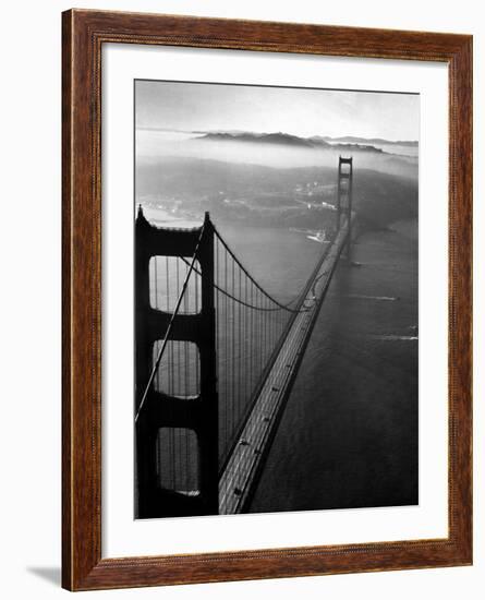 Car Lanes across the Golden Gate Bridge with Fog-Covered City of San Francisco in Background-Margaret Bourke-White-Framed Premium Photographic Print
