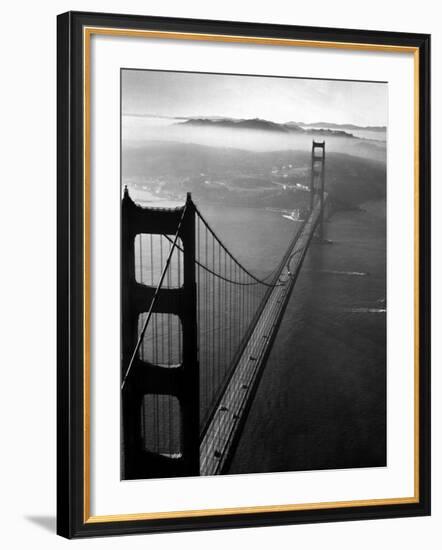 Car Lanes across the Golden Gate Bridge with Fog-Covered City of San Francisco in Background-Margaret Bourke-White-Framed Premium Photographic Print