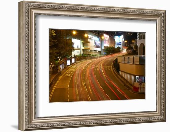 Car light trails on a busy road in Central, Hong Kong Island by night, Hong Kong, China, Asia-Fraser Hall-Framed Photographic Print