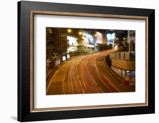 Car light trails on a busy road in Central, Hong Kong Island by night, Hong Kong, China, Asia-Fraser Hall-Framed Photographic Print