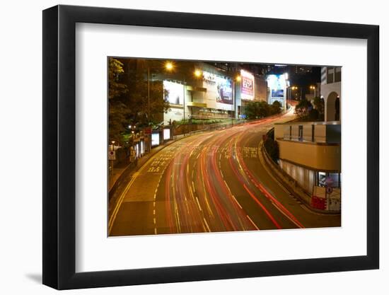 Car light trails on a busy road in Central, Hong Kong Island by night, Hong Kong, China, Asia-Fraser Hall-Framed Photographic Print