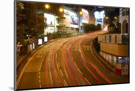 Car light trails on a busy road in Central, Hong Kong Island by night, Hong Kong, China, Asia-Fraser Hall-Mounted Photographic Print
