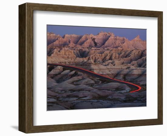 Car Traveling Through Badlands National Park-Layne Kennedy-Framed Photographic Print