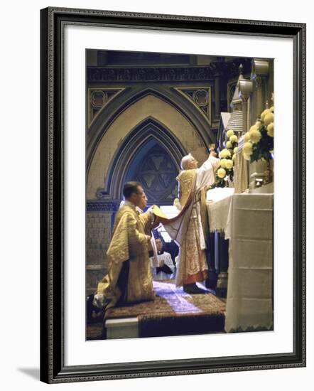 Cardinal Stritch Elevating Chalice after Transubstantiation During Mass-John Dominis-Framed Premium Photographic Print