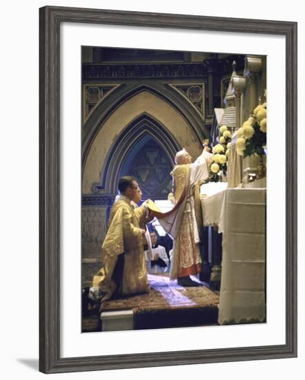 Cardinal Stritch Elevating Chalice after Transubstantiation During Mass-John Dominis-Framed Premium Photographic Print