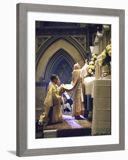 Cardinal Stritch Elevating Chalice after Transubstantiation During Mass-John Dominis-Framed Premium Photographic Print