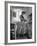 Career Girl Hostedd Joan Wilson in skirt and sleeveless blouse cooking in kitchen-Nina Leen-Framed Photographic Print